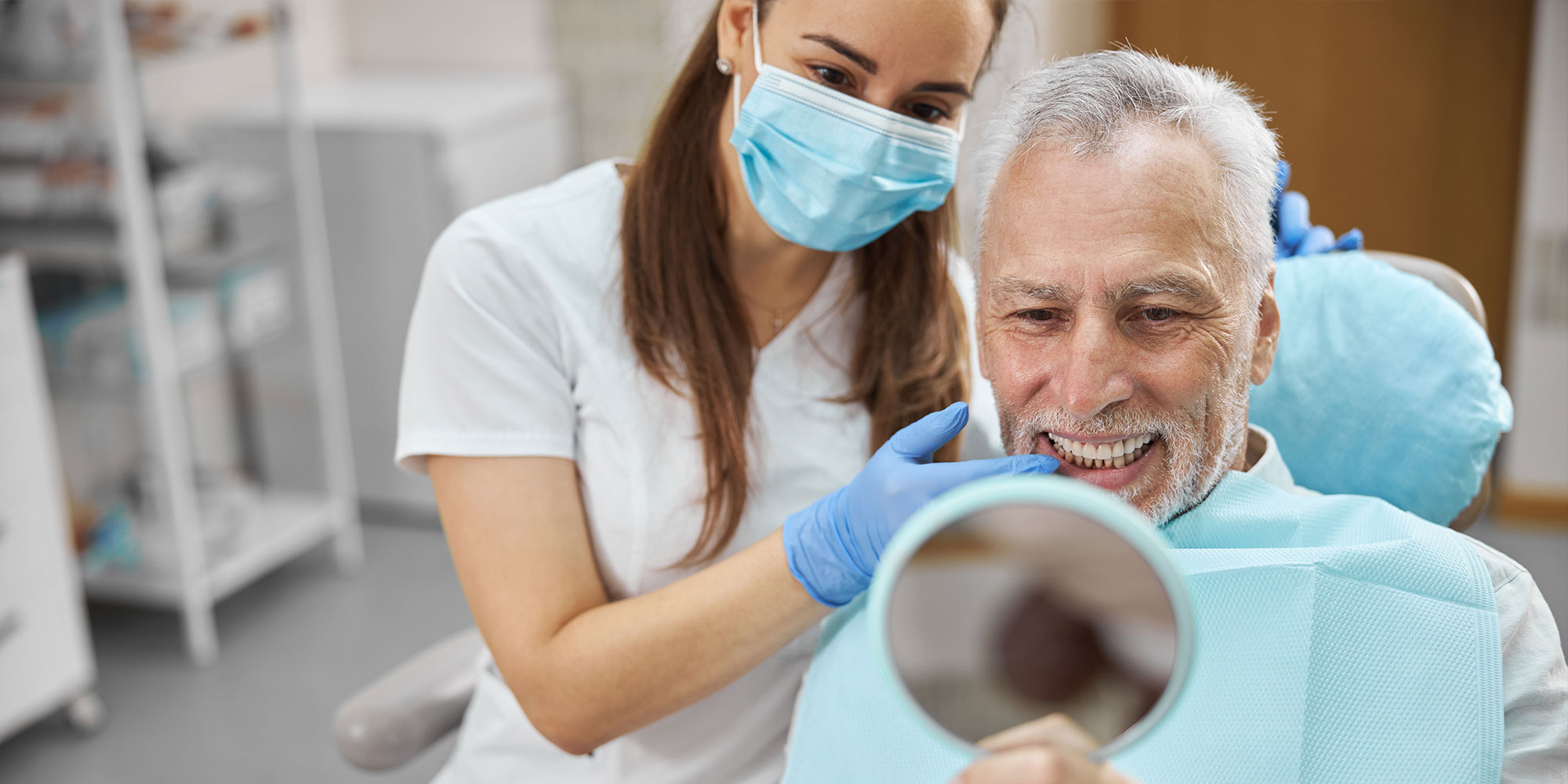 patient smiling. brightly after their dental procedure