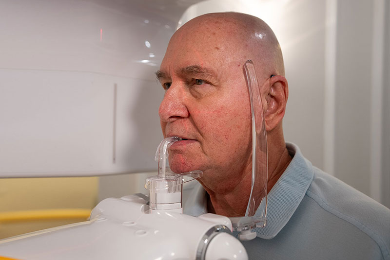 patient undergoing a cbct scan for their treatment