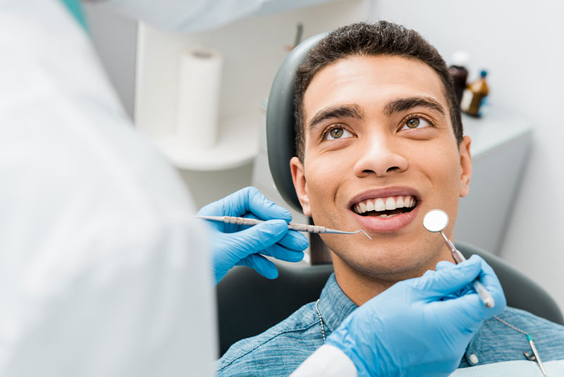 patient having a dental examination for their treatment