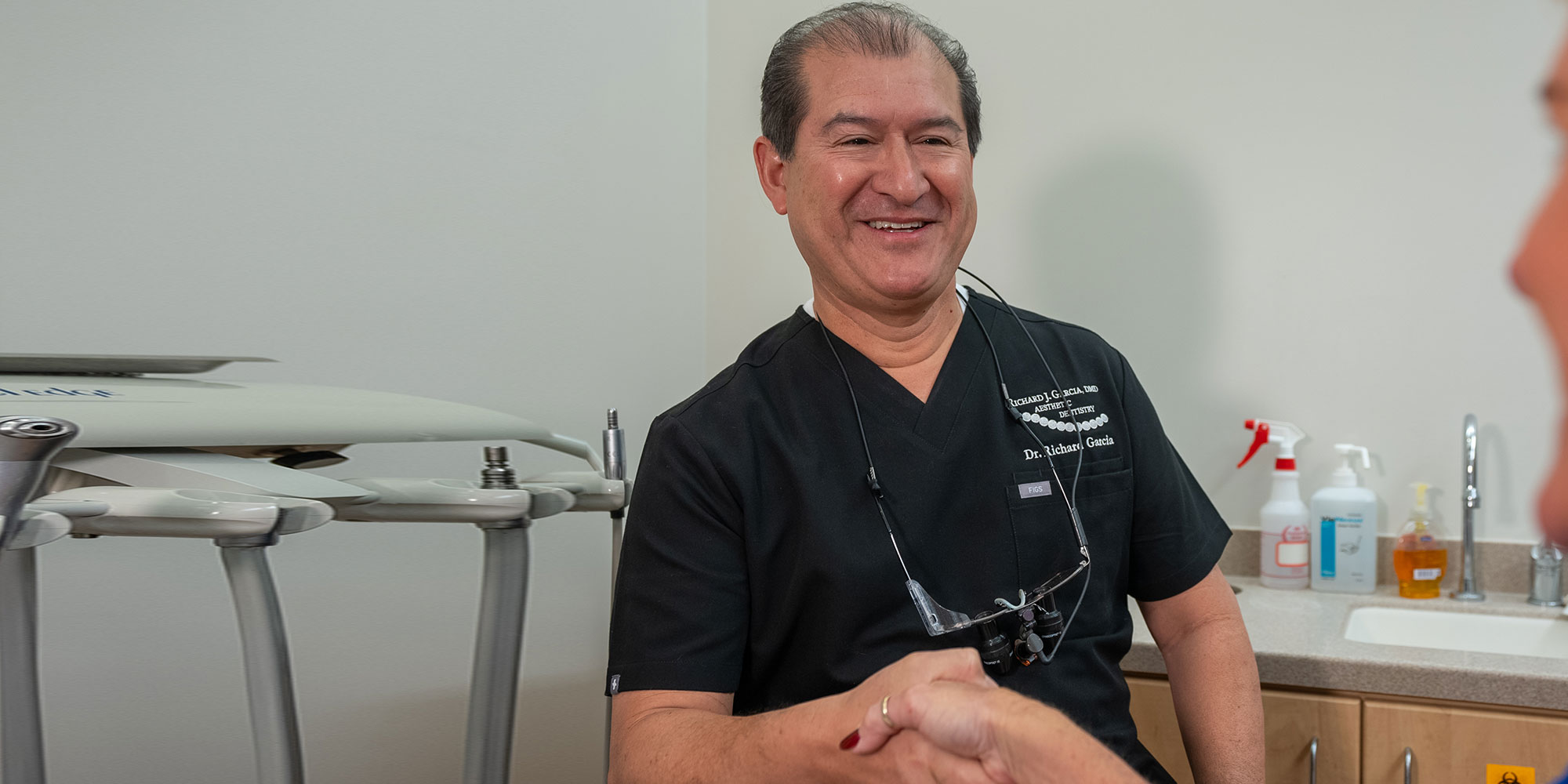 doctor shaking hands with patient