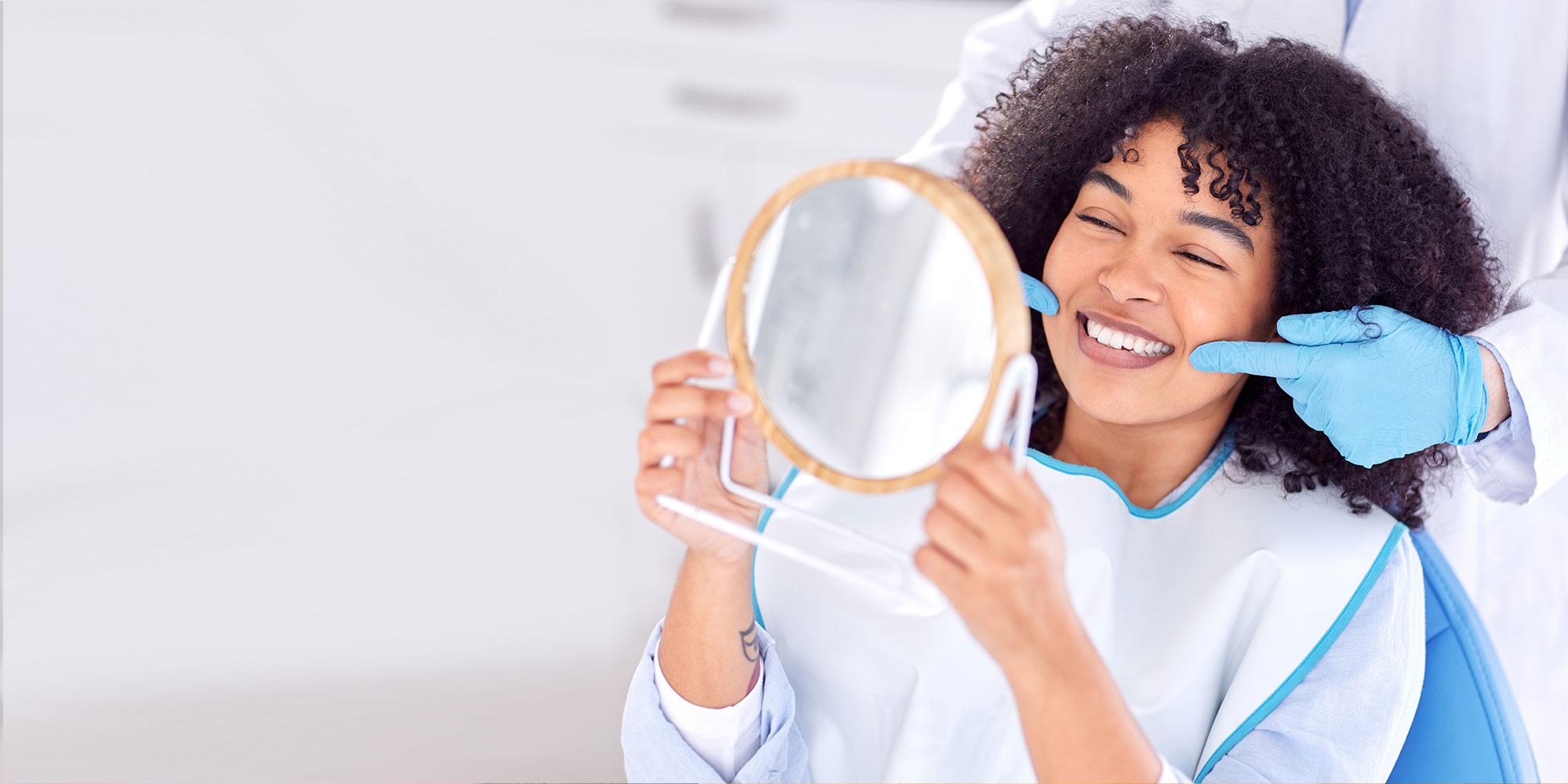close up of root canal patient smiling brightly after their dental procedure